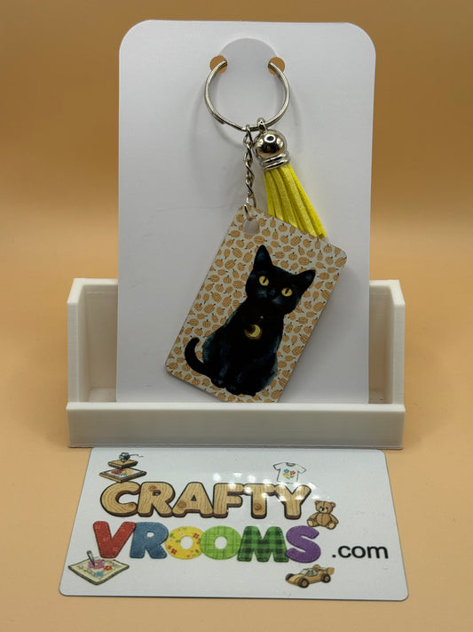 Rectangle keychain w/tassel - Academia magical cat