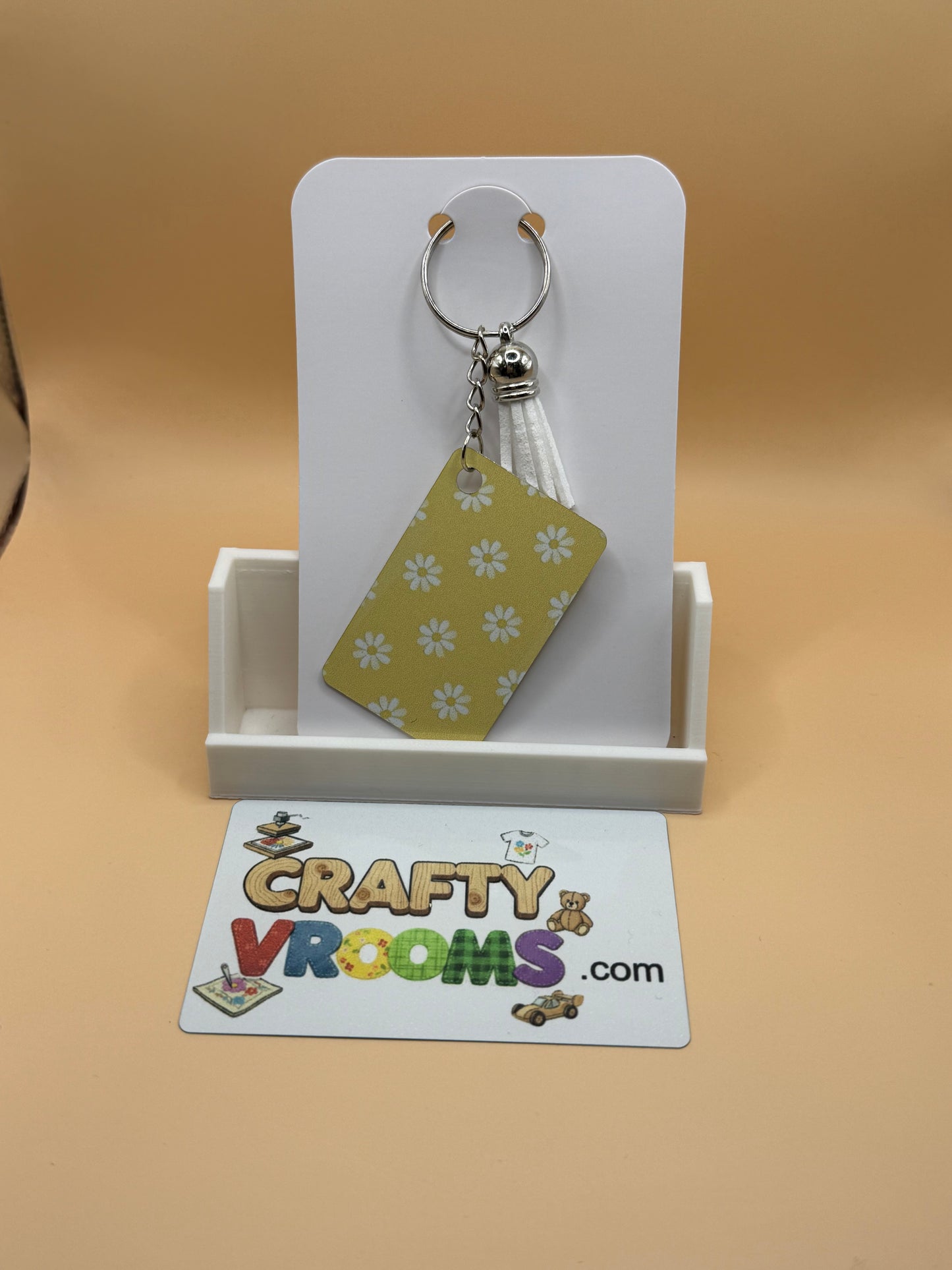 Rectangle keychain w/tassel - Floral yellow daisies