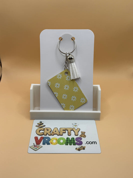 Rectangle keychain w/tassel - Floral yellow daisies